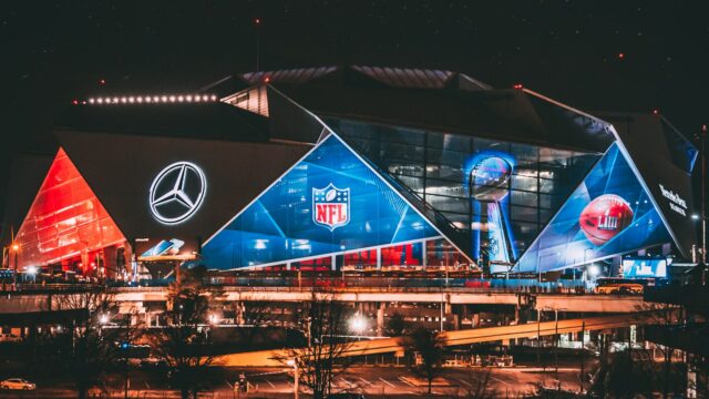 An NFL stadium lit up at night