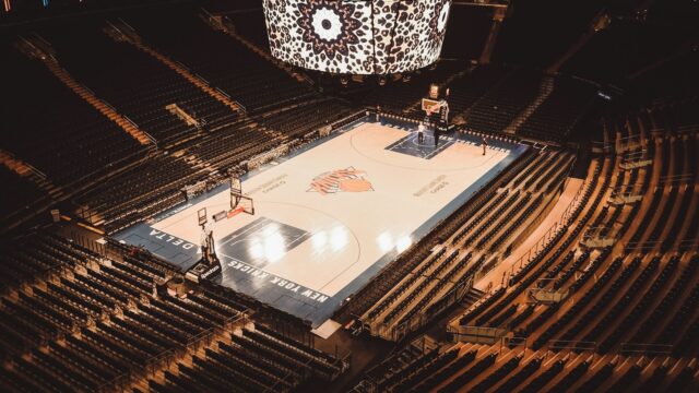 The basketball court inside Madison Square Garden, full of fans
